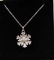 9ct White Gold Diamond Set 0.09ct Snow Crystal Pendant & 18" trace Chain